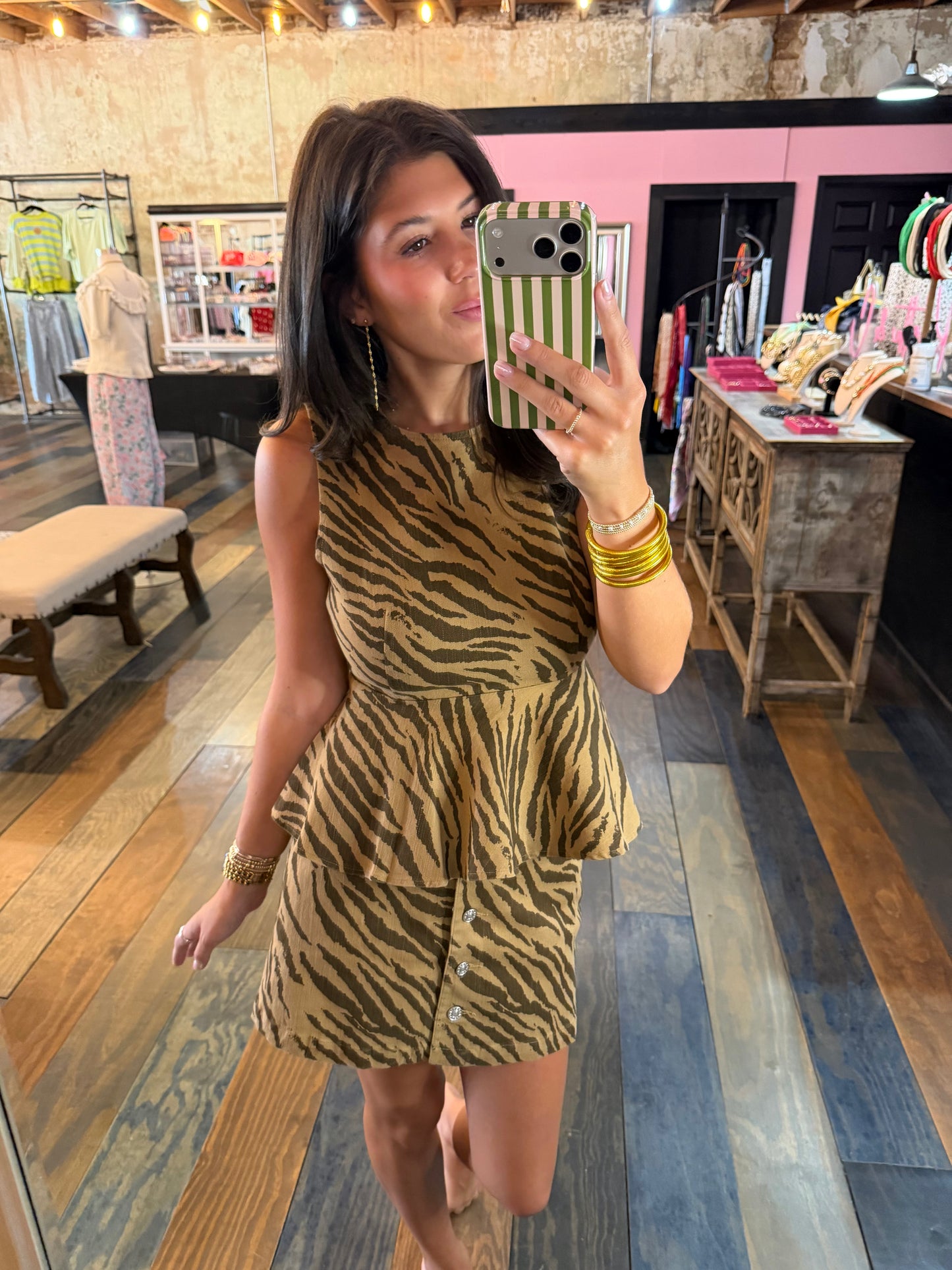 CAN’T BE TAMED PEPLUM TOP