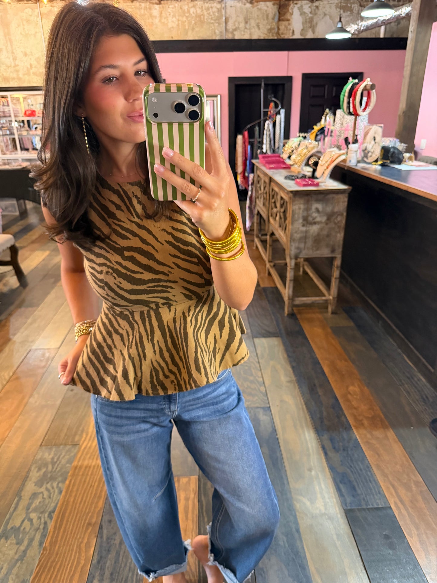 CAN’T BE TAMED PEPLUM TOP