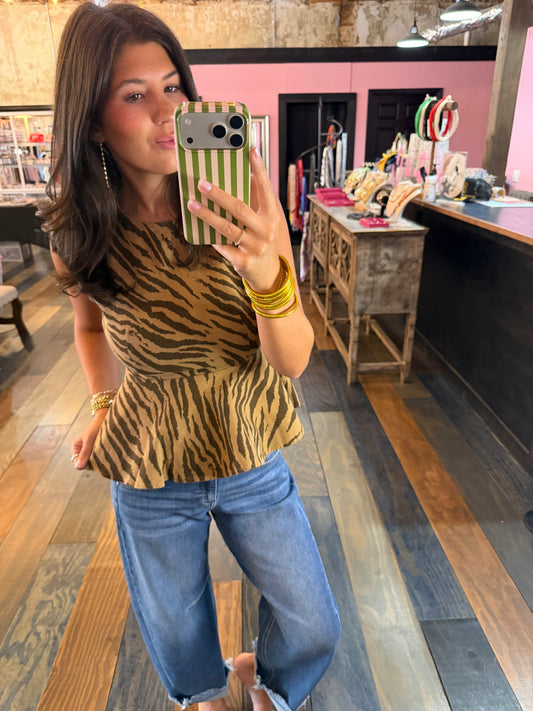 CAN’T BE TAMED PEPLUM TOP